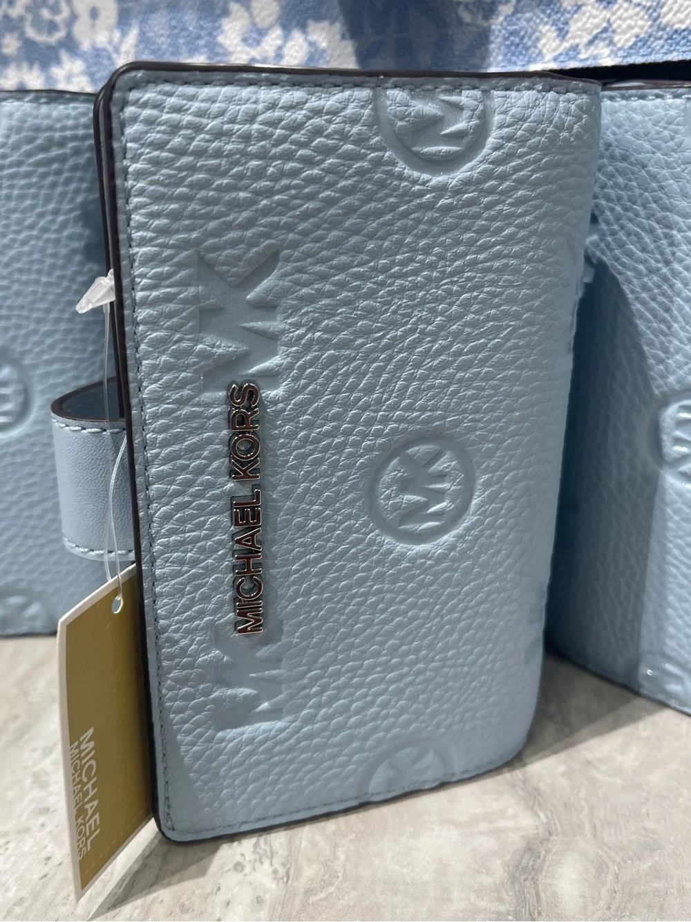 Michael Kors Embossed Logo Trifold Wallet - Light Blue